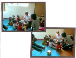 Uganda students and teacher in circle time talking.