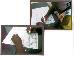 Uganda children writing.